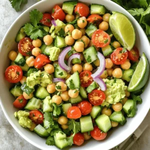 - 2 ripe avocados - 1 can (15 oz) chickpeas, drained and rinsed - 1 small red onion, finely chopped - 1 cup cherry tomatoes, halved - 1 cucumber, diced - 1 jalapeño, deseeded and minced (optional for spice) - 2 tablespoons fresh cilantro, chopped - Juice of 1 lime - 2 tablespoons olive oil - Salt and pepper to taste For my Smashed Avocado Chickpea Salad, I love these fresh and vibrant ingredients. The ripe avocados bring creaminess and flavor. Chickpeas add protein and a hearty feel. Red onion gives a nice crunch and a bit of zing. Cherry tomatoes add sweetness and color. Cucumber adds crispness, making each bite refreshing. If you like heat, jalapeño is a great choice. Fresh cilantro brightens the dish with its unique taste. The lime juice adds acidity, balancing the flavors. Olive oil ties everything together, making it luscious. Feel free to adjust the salt and pepper to your liking. This salad is not just tasty; it is also packed with nutrients. You can find the full recipe to guide you through the steps of making this delicious dish. To make this Smashed Avocado Chickpea Salad, we follow three main steps: - Cutting and smashing the avocados: First, cut the avocados in half. Remove the pit and scoop the flesh into a bowl. Use a fork to smash it. Aim for a creamy yet chunky texture. - Mashing the chickpeas: Open the can of chickpeas, drain, and rinse them. Add them to the bowl with the smashed avocado. Lightly mash them with a fork, leaving some whole for a nice texture. - Combining the ingredients: Add chopped red onion, halved cherry tomatoes, diced cucumber, minced jalapeño, and chopped cilantro. Mix everything gently to keep the ingredients intact. 1. Cut the avocados: Slice them in half, remove the pit, and scoop the flesh into a medium bowl. 2. Smash the avocados: Use a fork to mash the avocado until creamy but still chunky. 3. Add chickpeas: Place the drained chickpeas into the bowl. Mash them lightly with the avocado. 4. Mix in the vegetables: Stir in the red onion, cherry tomatoes, cucumber, jalapeño, and cilantro. 5. Season the salad: Squeeze lime juice and drizzle olive oil over the mixture. Gently fold it together. 6. Taste and adjust: Season with salt and pepper. Mix again, adjusting to your taste. Tips for achieving the best texture: - Use ripe avocados for creaminess. - Don’t over-mash the chickpeas; leave some whole. - Mix gently to keep the salad fresh and vibrant. For plating, serve the salad in a large bowl or on individual plates. Garnish with extra cilantro and a lime wedge for color. For a fun crunch, pair it with whole-grain pita chips. You can also place the salad on a bed of leafy greens for added nutrition. For the full recipe, see the detailed sections above. Enjoy your fresh and nourishing salad! To get the best texture for your avocado, use ripe ones. They should feel soft but not mushy. When you smash the avocados, aim for a creamy yet chunky mix. This adds a nice texture to your salad. When seasoning, start with a pinch of salt and black pepper. Taste it, then add more if needed. The lime juice adds brightness, so don’t hold back! To store leftovers, place the salad in an airtight container. This keeps it fresh for 1-2 days. To prevent browning, cover the top with plastic wrap directly on the salad. For keeping ingredients fresh before mixing, store the avocados and chickpeas separately. This way, you’ll enjoy the best taste and texture when ready to eat. One big mistake is over-mashing the ingredients. You want some chunks for texture. If everything turns into a puree, the salad loses its character. Another mistake is not seasoning enough. A little salt and pepper make a huge difference. Always taste your salad before serving to ensure it’s just right. For the full recipe, check out the main section! {{image_2}} You can easily make this dish vegan-friendly. The recipe already uses plant-based ingredients. Just ensure you check any added sauces or dressings. For gluten-free options, serve the salad with gluten-free crackers or fresh veggies. You can also enjoy it on a gluten-free wrap or lettuce leaves. To switch up the flavors, try adding diced bell peppers or corn. These add sweetness and crunch. You can also mix in a handful of olives for a briny kick. If you like it spicy, toss in more jalapeños or a dash of hot sauce. For herbs, swap cilantro with parsley or basil. Each herb gives the salad a new taste. Fresh dill can also add a nice touch. Using seasonal veggies can enhance your salad. In summer, fresh corn or zucchini work well. In fall, add roasted sweet potatoes or butternut squash. Adapting to what's in season keeps your meal fresh and exciting. You can also use leftovers from other meals. This way, nothing goes to waste, and your salad stays unique. For the full recipe, refer to the earlier section. To keep your Smashed Avocado Chickpea Salad fresh, store it in an airtight container. This helps prevent browning and keeps flavors locked in. The salad lasts for about 1 to 2 days in the fridge. Keep an eye on the avocado; it can brown quickly. I do not recommend freezing Smashed Avocado Chickpea Salad. Freezing changes the texture of avocado, making it mushy. If you must freeze it, pack it tightly in a freezer-safe bag. To refresh after thawing, add a little lime juice and fresh herbs to brighten the flavors. You can prepare the ingredients ahead of time for easy meals. Chop veggies and store them separately. This way, you can mix them with smashed avocado right before eating. Making a larger batch is also great for quick lunches. Just remember to store the avocado separately until you’re ready to eat. How long does Smashed Avocado Chickpea Salad last? This salad stays fresh for about 2 days in the fridge. Keep it in an airtight container. The avocados might brown a bit, but it will still taste good. Can I make this salad ahead of time? Yes, you can prep this salad up to 24 hours in advance. Just wait to add the lime juice until you are ready to serve. This keeps the avocados from browning too soon. Is this salad high in protein? Yes, this salad is high in protein. Chickpeas provide a great plant-based protein source. Each serving has about 7 grams of protein, which is excellent for a light meal. Nutritional benefits of the main ingredients - Avocados: They are rich in healthy fats, fiber, and vitamins. They support heart health and are great for skin. - Chickpeas: These legumes are full of protein and fiber, helping with digestion. They also keep you full longer. - Red Onion: It adds flavor and contains antioxidants. They can help reduce inflammation. - Cucumber: It's hydrating and low in calories. It also provides vitamin K. - Cherry Tomatoes: These are high in vitamins A and C. They help boost your immune system. What can I serve with this salad? You can serve this salad with whole-grain pita chips for crunch. It also pairs well with grilled chicken or fish for a heartier meal. Try it on a bed of leafy greens for extra nutrition. How to customize for dietary needs? You can easily make this salad vegan by leaving out the cheese. For gluten-free options, just ensure your pita chips are gluten-free. If you need it spicier, add more jalapeño or some hot sauce. There are many ways to enjoy it! This blog post covered everything you need for a tasty Smashed Avocado Chickpea Salad. We went over the key ingredients, step-by-step instructions, and helpful tips to perfect your dish. Remember to store leftovers properly and feel free to add your own twist. This salad is not only healthy but also easy to make and customize for everyone. Enjoy your cooking and share this recipe with friends for a fun meal together. Your kitchen adventures start now!