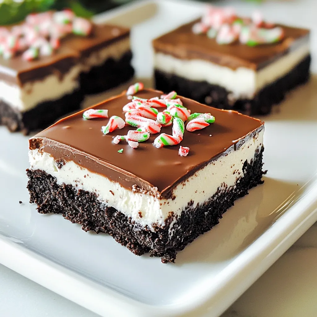 To create these tasty bars, gather these key ingredients: - 24 Oreo cookies, crushed - 1/2 cup unsalted butter, melted - 2 cups cream cheese, softened - 1 cup powdered sugar - 1 teaspoon peppermint extract - 1 cup semi-sweet chocolate chips - 1 teaspoon coconut oil (or vegetable oil) - 1/4 cup crushed peppermint candies (for topping) These ingredients blend to form a rich, creamy, and crunchy treat. You can switch some ingredients based on your taste. Here are a few ideas: - Use gluten-free Oreos for a gluten-free option. - Swap cream cheese with a dairy-free version for vegan bars. - Try white chocolate chips instead of semi-sweet chocolate for a sweeter taste. - Replace peppermint extract with vanilla extract for a different flavor. Toppings add fun and flair to your bars. Consider these options: - Drizzle extra melted chocolate over the top for a fancy look. - Use mini marshmallows or chocolate sprinkles for extra sweetness. - Garnish with small peppermint sticks for a festive touch. These toppings make your dessert even more appealing and tasty. To start, grab a mixing bowl. Add 24 crushed Oreo cookies and 1/2 cup of melted unsalted butter. Mix until every crumb is coated. This mix forms the base of your bars. Next, take a 9x9 inch square pan. Press the Oreo mixture firmly into the bottom. Make sure it is even. Refrigerate this base for about 15 minutes. This helps it set well. Now, in a separate bowl, beat 2 cups of softened cream cheese. Use a hand mixer for the best results. Mix until smooth. Gradually add 1 cup of powdered sugar and 1 teaspoon of peppermint extract. Keep beating until everything is well combined. This cream cheese layer gives the bars a rich flavor. Next, take a microwave-safe bowl. Combine 1 cup of semi-sweet chocolate chips with 1 teaspoon of coconut oil. Microwave this mix in 30-second intervals. Stir in between to avoid burning. Once melted and smooth, pour the chocolate over the cream cheese layer. Use a spatula to spread it evenly. Finally, sprinkle 1/4 cup of crushed peppermint candies on top of the chocolate. Press them down gently so they stick. Now, refrigerate the bars for at least 3 hours. This makes them firm enough to cut. Once set, lift the bars from the pan. Cut them into squares or rectangles. Enjoy your delicious creation! When mixing, always start with the right tools. A large bowl helps combine ingredients well. Use a sturdy spatula to mix the Oreo crumbs and melted butter. This mix should stick together. For melting chocolate, a microwave works best. Heat it in short bursts of 30 seconds. Stir in between to avoid burning. This keeps the chocolate nice and smooth. For a smooth cream cheese layer, make sure your cream cheese is very soft. Let it sit at room temperature for about 30 minutes. Use a hand mixer to beat it until creamy. Add the powdered sugar slowly. This helps combine the sugar well without lumps. Always scrape down the bowl to mix evenly. To make these bars even better, try adding some fun touches. You can mix in mini chocolate chips for extra texture. A pinch of sea salt can enhance the chocolate flavor. If you like a stronger mint taste, add a bit more peppermint extract. For a festive look, sprinkle some crushed nuts or colored sprinkles on top. {{image_2}} You can make a vegan version of these bars. Start with vegan Oreo cookies. Use coconut oil instead of butter. For the cream cheese, pick a dairy-free option. Many brands offer tasty vegan cream cheese now. Use powdered sugar as usual. The rest of the steps remain the same. You get a rich and creamy treat without any dairy. Feel free to swap out the Oreo cookies. Try chocolate sandwich cookies for a richer taste. Vanilla cookies can give a lighter flavor. If you want crunch, use graham crackers. Each type of cookie brings its own fun twist. The key is to keep the base firm and tasty. Peppermint is great, but you can change it up. Use vanilla extract for a classic touch. Almond extract gives a nutty flavor that many enjoy. You could even try orange or lemon for a zesty kick. Each change offers a new taste experience. Just remember to keep the amount the same for balance. To keep your No-Bake Chocolate Peppermint Oreo Bars fresh, store them in an airtight container. This prevents moisture and keeps them tasty. You can layer parchment paper between bars to avoid sticking. Make sure to refrigerate them right after cutting. This keeps the bars firm and ready to enjoy. These delicious bars can last in the fridge for about a week. Over time, they may lose some texture but will still taste great. Always check for any signs of spoilage before indulging. If you see any changes in color or smell, it’s best to toss them out. If you want to keep them longer, freezing is a great option. Wrap each bar in plastic wrap, then place them in a freezer-safe bag. They can stay in the freezer for up to three months. When you're ready to enjoy, let them thaw in the fridge overnight for the best taste and texture. Yes, you can use regular cream cheese. However, it is best to soften it first. Softening helps the cream cheese mix well with the sugar. You can soften it by leaving it out at room temperature for about 30 minutes or microwaving it for 10-15 seconds. If you lack peppermint extract, you can use mint extract as a substitute. Mint extract gives a similar flavor. You can also use crushed peppermint candies in the cream cheese mixture for a more intense taste. Adjust the amount to your liking. To make these bars gluten-free, use gluten-free Oreo cookies. Many brands offer gluten-free options that taste great. Check the labels to ensure they meet your needs. The other ingredients are naturally gluten-free. You can use other types of chocolate. Dark chocolate adds a rich flavor, while milk chocolate offers sweetness. White chocolate is another option, but it will change the flavor profile. Melt and pour the chocolate as you would with semi-sweet chocolate. In this blog post, we covered the essential ingredients for no-bake chocolate peppermint Oreo bars, along with optional ones. I shared step-by-step instructions, tips, and variations. You can customize this treat to fit your taste and needs. Remember to store them properly for the best flavor. Whether you make them vegan or play with flavors, these bars will impress. Enjoy making and sharing these fun, easy treats!