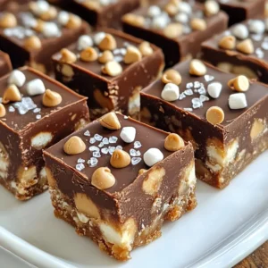 For a rich and creamy peanut butter chocolate fudge, you need these simple ingredients: - 1 cup creamy peanut butter - 1 cup semi-sweet chocolate chips - 1/2 cup sweetened condensed milk - 1/4 teaspoon sea salt - 1 teaspoon vanilla extract - 1/4 cup chopped nuts (walnuts or almonds, optional) - 1/4 cup mini marshmallows (optional, for extra texture) Each ingredient plays a key role in creating that perfect fudge. The creamy peanut butter gives a nutty flavor and smooth texture. Semi-sweet chocolate chips bring sweetness and depth. Sweetened condensed milk adds creaminess and helps everything stick together. The sea salt balances the sweetness, while vanilla extract enhances the flavor. Nuts and marshmallows add fun textures. You can mix things up with these optional ingredients: - Chopped nuts (walnuts or almonds) - Mini marshmallows Adding nuts gives a nice crunch. Mini marshmallows add a soft, chewy bite. You can also try different toppings like extra chocolate chips or a sprinkle of sea salt on top for flair. If you don’t have some ingredients, don’t worry! Here are some substitutes you can use: - Natural peanut butter instead of creamy peanut butter - Dark chocolate chips instead of semi-sweet chocolate chips - Coconut milk can replace sweetened condensed milk These swaps can change the taste a bit but will still lead to a tasty fudge. Just keep in mind that the texture might differ slightly. {{ingredient_image_1}} To start, grab an 8x8-inch baking dish. Line it with parchment paper. Make sure to leave some overhang. This will help you lift the fudge out later. The paper keeps the fudge from sticking. It’s an easy way to ensure a clean finish. Next, take a medium saucepan. Combine the creamy peanut butter, semi-sweet chocolate chips, sweetened condensed milk, and sea salt. Heat this mix over medium-low heat. Stir constantly until everything melts together. The goal is a smooth and creamy texture. This step is key to getting a rich taste. Once your mixture is smooth, take it off the heat. Stir in the vanilla extract for added flavor. If you want to add chopped nuts or mini marshmallows, now is the time. Fold them in gently. This adds fun textures to your fudge. After mixing, pour the fudge into your prepared dish. Use a spatula to spread it evenly. Avoid these common mistakes for the best results with your fudge: - Not stirring enough: Stirring keeps the fudge smooth. - Using too high heat: Medium-low heat is key for melting. - Skipping the sea salt: Salt enhances the flavors. Don’t skip it! To get the right texture, follow these tips: - Use creamy peanut butter: Creamy gives a smooth finish. - Melt slowly: Slow melting keeps it creamy. - Cool slowly: Let it cool at room temp before chilling. Here are the tools I find most helpful: - Medium saucepan: For melting your mixture. - Spatula: Great for spreading the fudge evenly. - 8x8-inch baking dish: Perfect size for this recipe. - Parchment paper: Helps with easy removal. Using the right tools will make your fudge-making easier and more fun! Pro Tips Use Quality Ingredients: The better the quality of your chocolate and peanut butter, the richer and more decadent your fudge will taste. Don’t Overheat: When melting the mixture, keep the heat low and stir constantly to avoid burning the chocolate and creating a gritty texture. Storage Secrets: For the best texture, store the fudge in an airtight container in the refrigerator, where it will stay fresh for up to a week. Customize Your Fudge: Feel free to experiment with different mix-ins like dried fruits or flavored extracts to create unique variations of this fudge. {{image_2}} You can change the flavor of your fudge easily. Adding mint extract gives a fresh twist. Just use a half teaspoon. For a salty kick, sprinkle sea salt on top. It pairs well with the sweet chocolate. You can make this fudge vegan by using dairy-free chocolate chips. Swap sweetened condensed milk for coconut cream. This keeps it creamy and rich. For gluten-free fudge, check the labels on your ingredients. Most chocolate chips are gluten-free, but always verify. Dried fruits add a chewy texture. Try raisins, cranberries, or chopped apricots. Different nuts can change the taste too. Walnuts and almonds are great, but pecans or cashews also work well. You can mix and match to find your favorite combo! To keep your peanut butter chocolate fudge fresh, store it in an airtight container. Make sure the fudge is completely cool before placing it in the container. If you want to keep it extra safe, you can layer parchment paper between the fudge squares. This method helps prevent sticking. When stored correctly, your fudge can last up to two weeks at room temperature. If you keep it in the fridge, it can last for about three weeks. Just remember to check for any signs of spoilage, like odd smells or changes in texture. You can freeze the fudge for longer storage. Wrap each piece in plastic wrap and then place them in a freezer-safe bag. This way, they stay fresh and tasty. Frozen fudge can last up to three months. When you're ready to eat it, let it thaw in the fridge overnight. Enjoy your sweet treat whenever you like! Yes, you can use natural peanut butter. It may change the fudge's texture. Natural peanut butter has less sugar and oil. This can make your fudge less sweet and a bit crumbly. If you prefer a smoother fudge, stick with creamy peanut butter. If your fudge is too soft, chill it longer. Place it in the fridge for an extra hour or two. You can also try adding more chocolate chips to thicken it. Melt them in and mix well. This helps create a firmer texture. To cut fudge into perfect squares, use a sharp knife. First, let the fudge set completely. Then, lift it out of the dish using parchment paper. Place it on a cutting board. Wipe the knife with a damp cloth between cuts for clean edges. Yes, you can make fudge without sweetened condensed milk. Try using coconut cream or a mix of butter and sugar instead. These alternatives still create a creamy fudge. Adjust the amount of chocolate to balance sweetness. In this blog post, we explored the key ingredients for fudge, how to prepare it, and tips for success. We looked at tasty variations and proper storage methods too. Fudge is fun and easy to make, and you can get creative with flavors. Remember to follow the steps and use the right tools for the best results. Enjoy your fudge, and don’t be afraid to try new ideas!